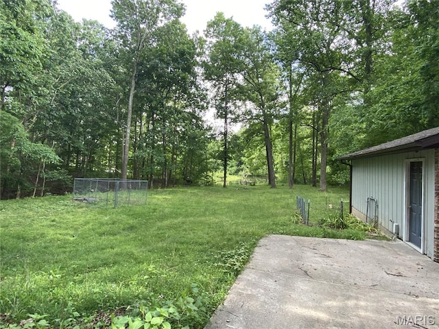 236 Mohawk Dr, Cape Girardeau, MO 63701 - view of green lawn featuring a patio