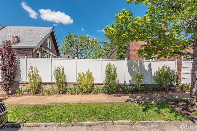 view of yard with fence