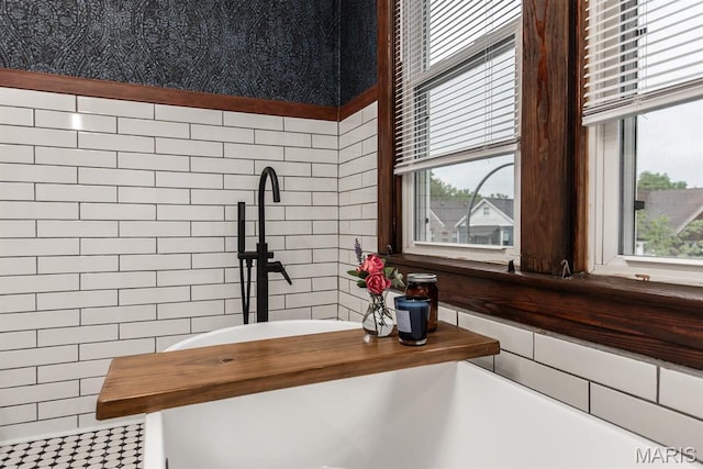 bathroom view of tile walls