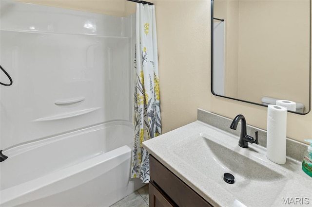 full bathroom with vanity and shower / tub combo with curtain