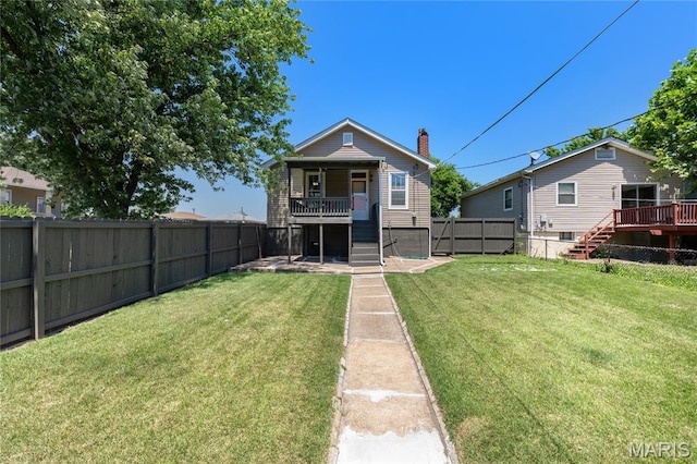 4020 Neosho St, Saint Louis, MO 63116 - back of house featuring stairway, a wooden deck, and a chimney