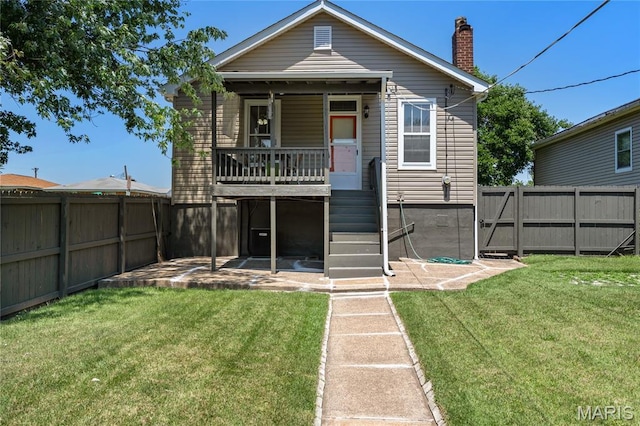 4020 Neosho St, Saint Louis, MO 63116 - back of property featuring a chimney and stairs