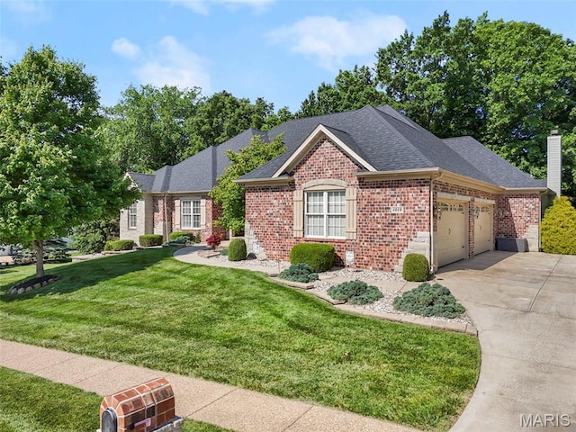 1019 Hawks Landing Dr, Lake St Louis, MO 63367 - view of front facade featuring brick siding, an attached garage, a front yard, roof with shingles, and concrete driveway