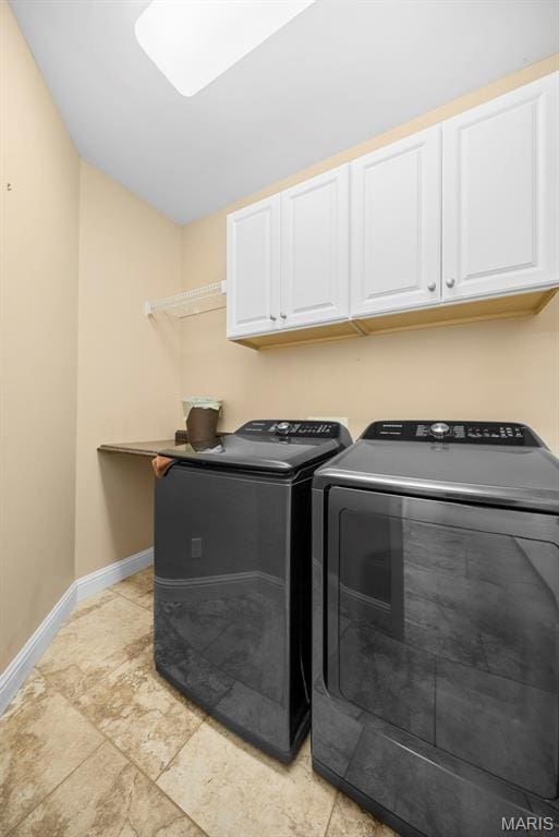 1019 Hawks Landing Dr, Lake St Louis, MO 63367 - laundry room with cabinet space, independent washer and dryer, and baseboards
