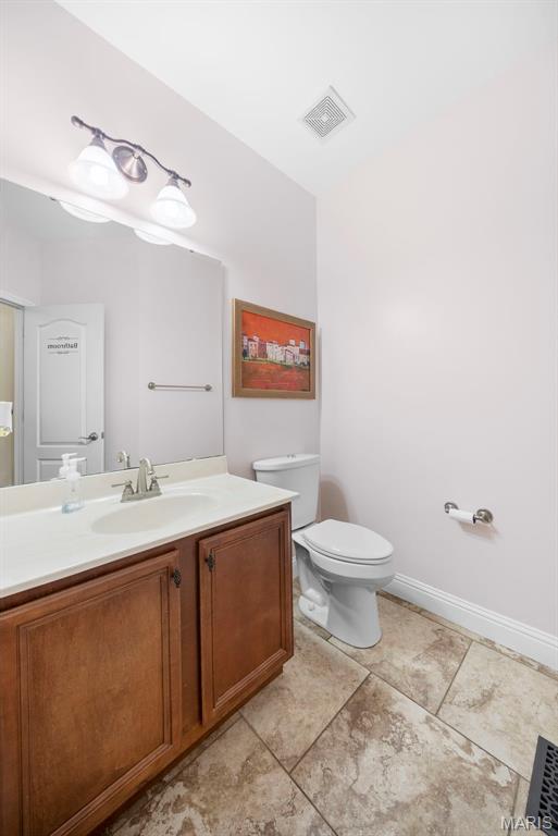1019 Hawks Landing Dr, Lake St Louis, MO 63367 - bathroom featuring vanity and toilet