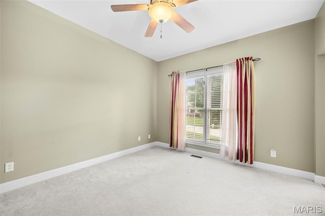 1019 Hawks Landing Dr, Lake St Louis, MO 63367 - unfurnished room featuring light carpet, baseboards, and a ceiling fan