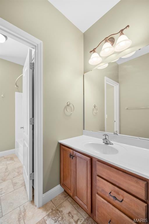 1019 Hawks Landing Dr, Lake St Louis, MO 63367 - full bathroom with vanity, shower / washtub combination, baseboards, and tile patterned floors