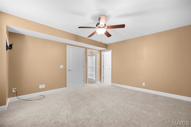 1019 Hawks Landing Dr, Lake St Louis, MO 63367 - spare room featuring a ceiling fan, carpet flooring, and baseboards