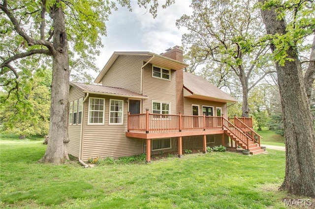 968 Super Slab Rd, Greenfield, IL 62044 - rear view of property featuring a deck, a chimney, a lawn, and stairs