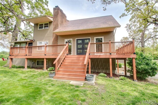 968 Super Slab Rd, Greenfield, IL 62044 - rear view of property with a wooden deck, a lawn, and a chimney
