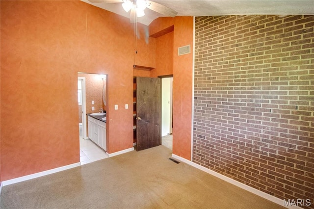 968 Super Slab Rd, Greenfield, IL 62044 - unfurnished room featuring a ceiling fan, high vaulted ceiling, and baseboards