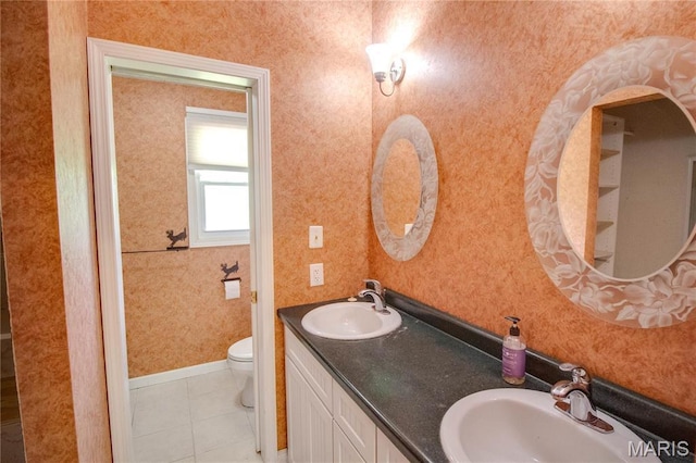 968 Super Slab Rd, Greenfield, IL 62044 - full bathroom with toilet, tile patterned flooring, double vanity, and wallpapered walls