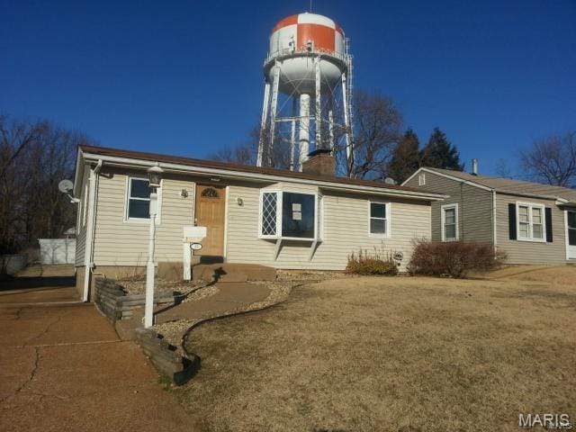 view of front of property with a chimney
