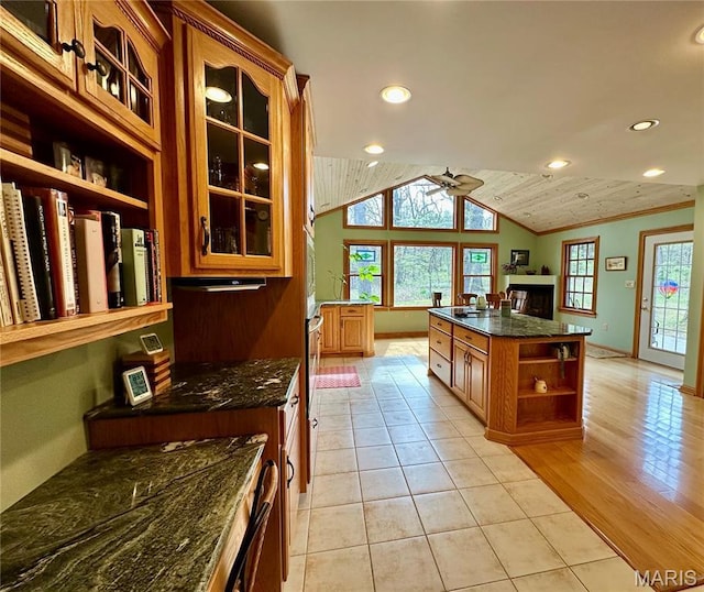 15716 County Road 5190, Rolla, MO 65401 - kitchen featuring open shelves, ornamental molding, ceiling fan, glass insert cabinets, and recessed lighting