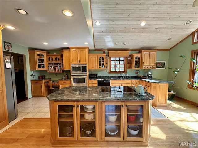 15716 County Road 5190, Rolla, MO 65401 - kitchen with appliances with stainless steel finishes, glass insert cabinets, a sink, a center island, and recessed lighting