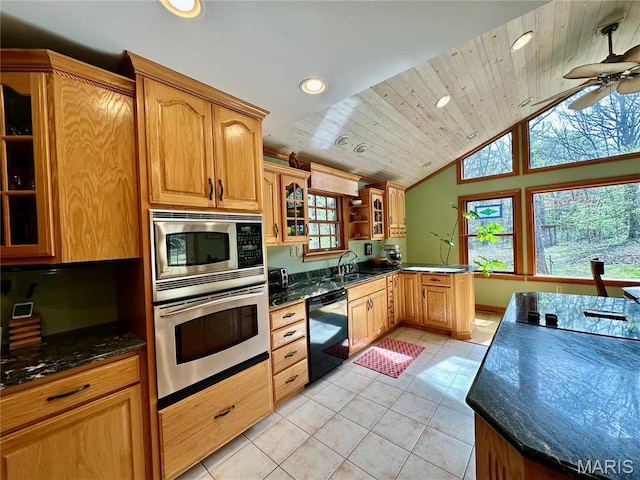 15716 County Road 5190, Rolla, MO 65401 - kitchen featuring appliances with stainless steel finishes, recessed lighting, plenty of natural light, glass insert cabinets, and light tile patterned floors