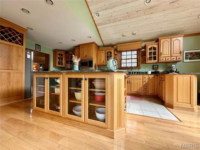 15716 County Road 5190, Rolla, MO 65401 - kitchen featuring stainless steel microwave, glass insert cabinets, a sink, light wood-style floors, and recessed lighting