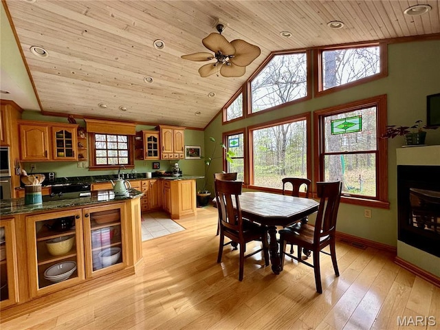 15716 County Road 5190, Rolla, MO 65401 - dining area with wood ceiling, healthy amount of natural light, light wood-style floors, high vaulted ceiling, and a ceiling fan