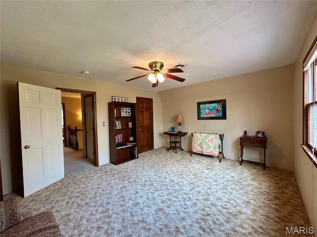 15716 County Road 5190, Rolla, MO 65401 - living area with carpet floors and a ceiling fan