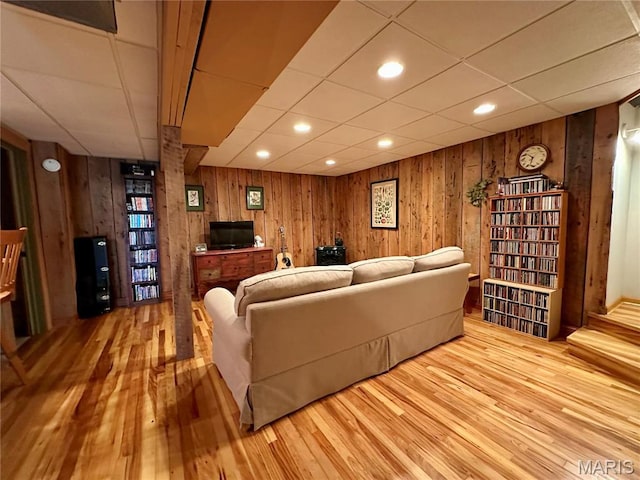 15716 County Road 5190, Rolla, MO 65401 - living area with wood finished floors, wood walls, a paneled ceiling, and recessed lighting