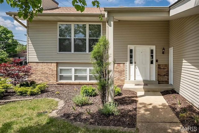 101 Holly Green Dr, Ballwin, MO 63021 - property entrance with brick siding