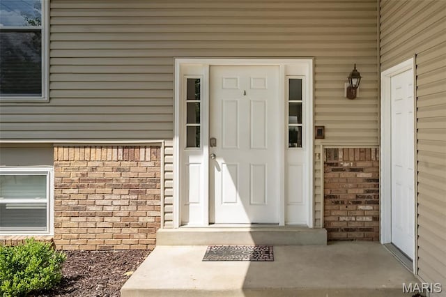101 Holly Green Dr, Ballwin, MO 63021 - property entrance with brick siding