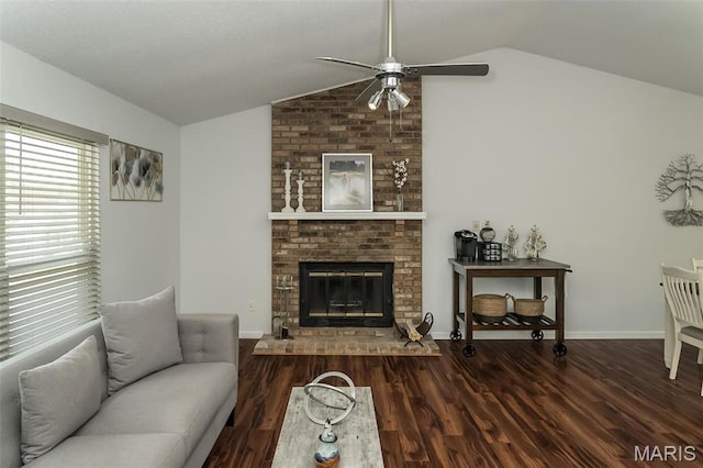 101 Holly Green Dr, Ballwin, MO 63021 - living room featuring lofted ceiling, ceiling fan, wood finished floors, a fireplace, and baseboards
