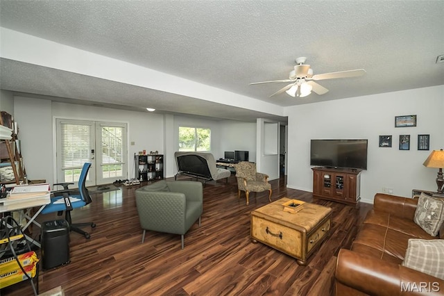 101 Holly Green Dr, Ballwin, MO 63021 - living room with an office area, wood finished floors, a ceiling fan, a textured ceiling, and baseboards