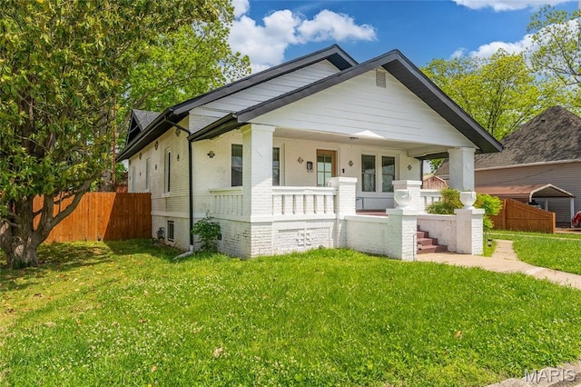 305 W Ray St, Christopher, IL 62822 - bungalow featuring covered porch and brick siding