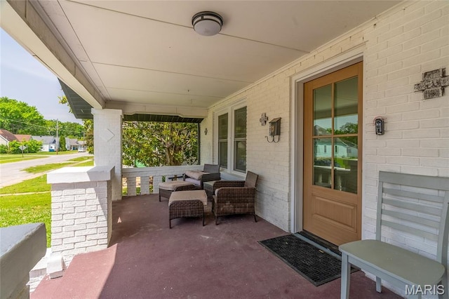 305 W Ray St, Christopher, IL 62822 - view of patio featuring a porch