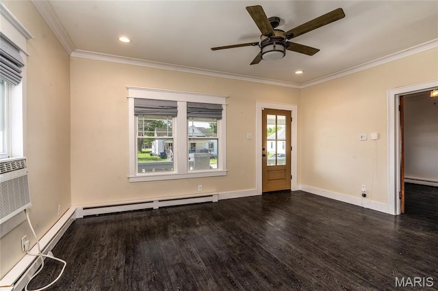 305 W Ray St, Christopher, IL 62822 - spare room featuring dark wood-style floors, crown molding, ceiling fan, a baseboard radiator, and baseboards