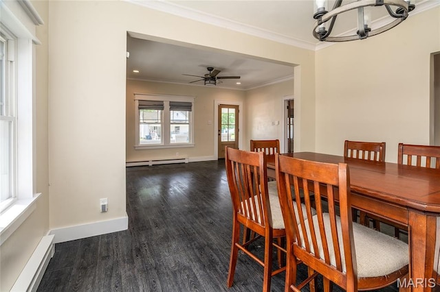 305 W Ray St, Christopher, IL 62822 - dining space featuring a chandelier, a baseboard radiator, wood finished floors, a baseboard heating unit, and crown molding
