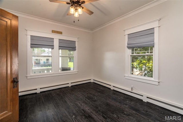 305 W Ray St, Christopher, IL 62822 - spare room with dark wood-style flooring, a ceiling fan, ornamental molding, and plenty of natural light