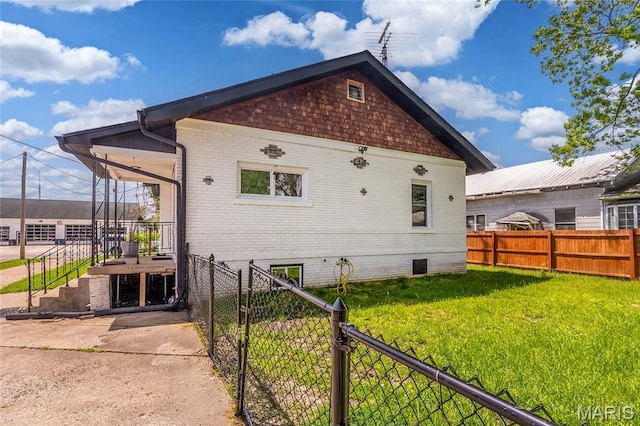 305 W Ray St, Christopher, IL 62822 - rear view of property with brick siding