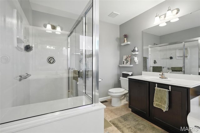 71 Hidden Mill Ct, Moscow Mills, MO 63362 - bathroom with toilet, a stall shower, vanity, and baseboards