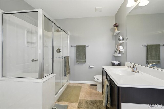 71 Hidden Mill Ct, Moscow Mills, MO 63362 - full bathroom featuring vanity, toilet, a shower stall, and baseboards