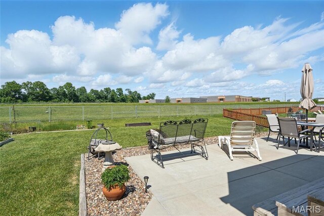 71 Hidden Mill Ct, Moscow Mills, MO 63362 - view of patio featuring outdoor dining space and a rural view