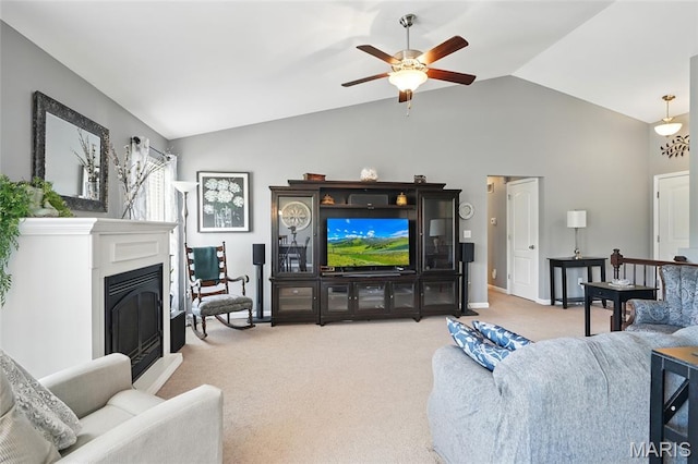 71 Hidden Mill Ct, Moscow Mills, MO 63362 - carpeted living room featuring vaulted ceiling, a glass covered fireplace, and a ceiling fan