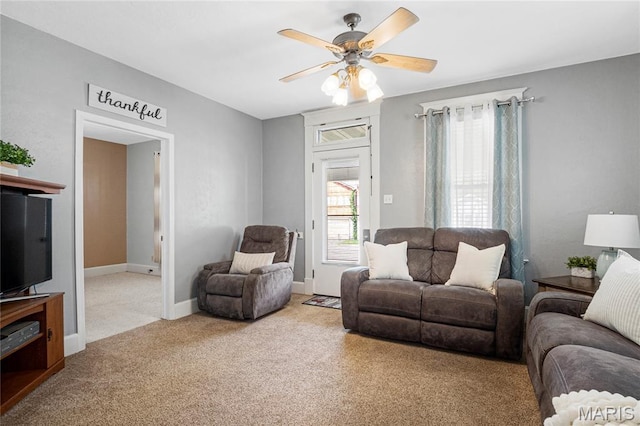 106 E Ofallon Dr, Caseyville, IL 62232 - living room with carpet flooring, a ceiling fan, and baseboards