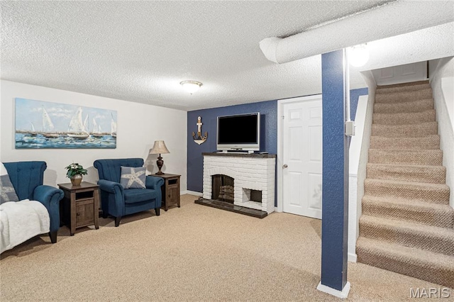 106 E Ofallon Dr, Caseyville, IL 62232 - living room featuring stairway, carpet floors, a textured ceiling, and a fireplace