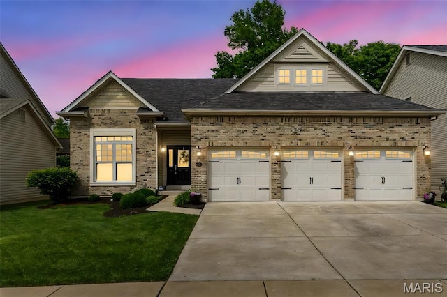 1804 Sterling Oaks Dr, Saint Peters, MO 63376 - view of front facade featuring an attached garage, driveway, a front yard, and brick siding