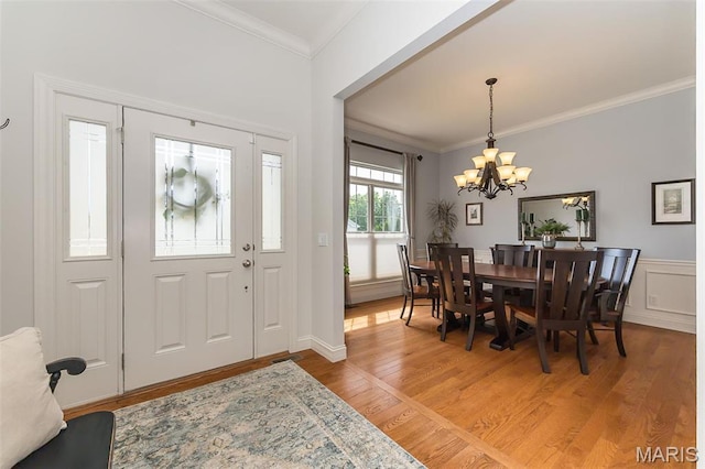 1804 Sterling Oaks Dr, Saint Peters, MO 63376 - entrance foyer featuring light wood finished floors, a chandelier, and ornamental molding