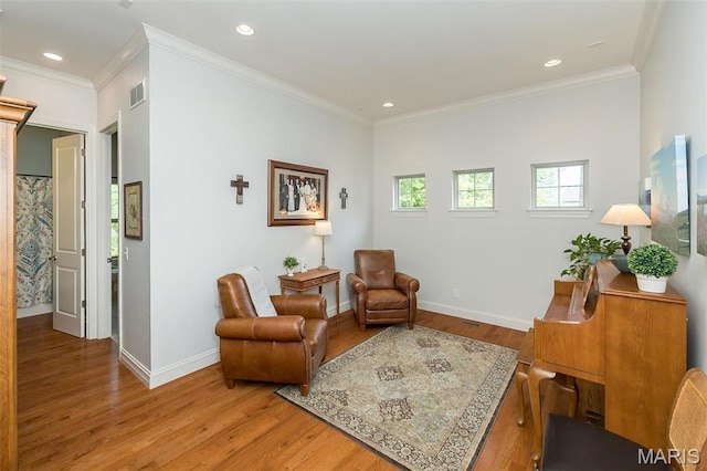 1804 Sterling Oaks Dr, Saint Peters, MO 63376 - sitting room with light wood-style flooring, baseboards, recessed lighting, and crown molding