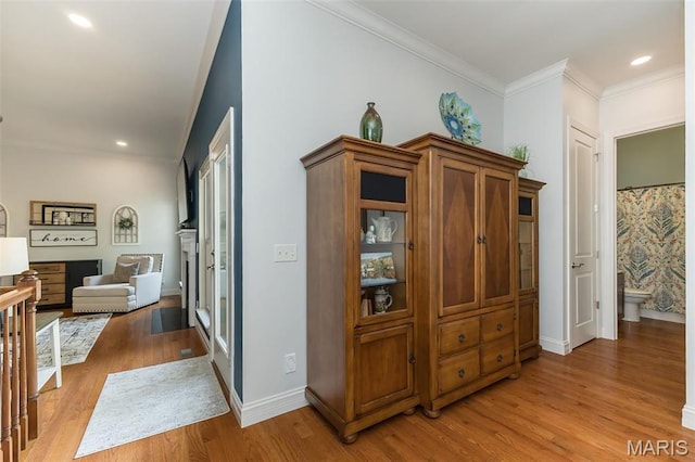 1804 Sterling Oaks Dr, Saint Peters, MO 63376 - hall featuring light wood-type flooring, crown molding, baseboards, and recessed lighting