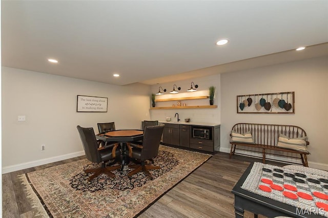 1804 Sterling Oaks Dr, Saint Peters, MO 63376 - dining room with wet bar, baseboards, dark wood finished floors, and recessed lighting