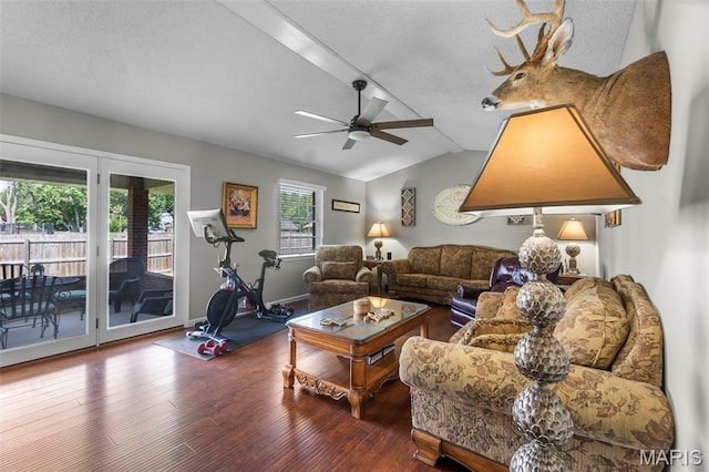729 Euclid Dr, Sikeston, MO 63801 - living area with plenty of natural light, a ceiling fan, wood finished floors, lofted ceiling, and a textured ceiling