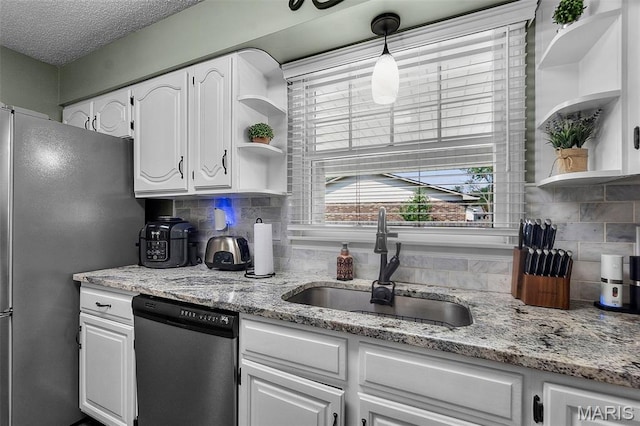 729 Euclid Dr, Sikeston, MO 63801 - kitchen featuring open shelves, stainless steel appliances, white cabinetry, a sink, and a textured ceiling