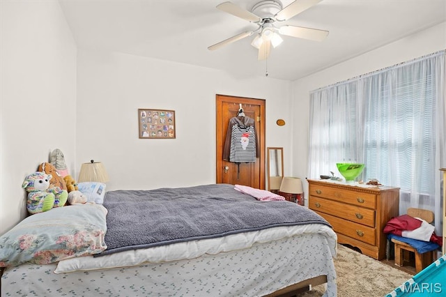 bedroom featuring a ceiling fan