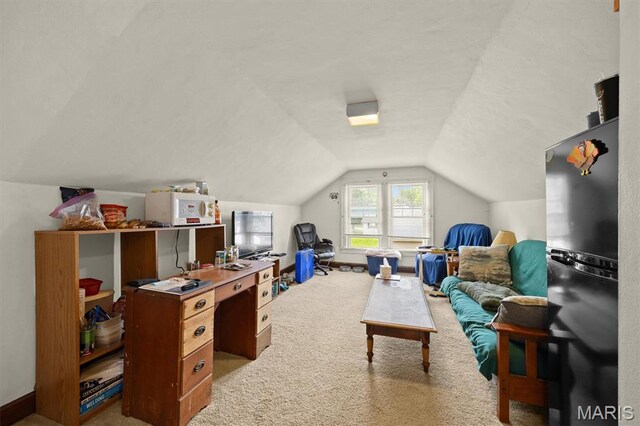 recreation room featuring vaulted ceiling, carpet floors, baseboards, and a desk