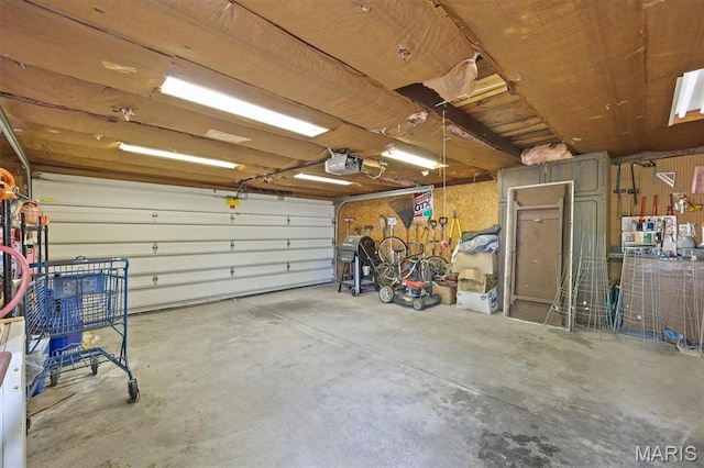 garage featuring a garage door opener